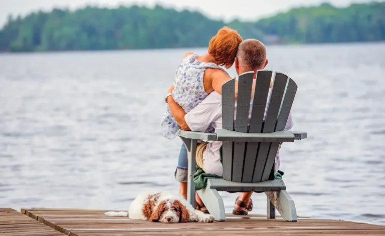 Lake Anna couple on dock with dog